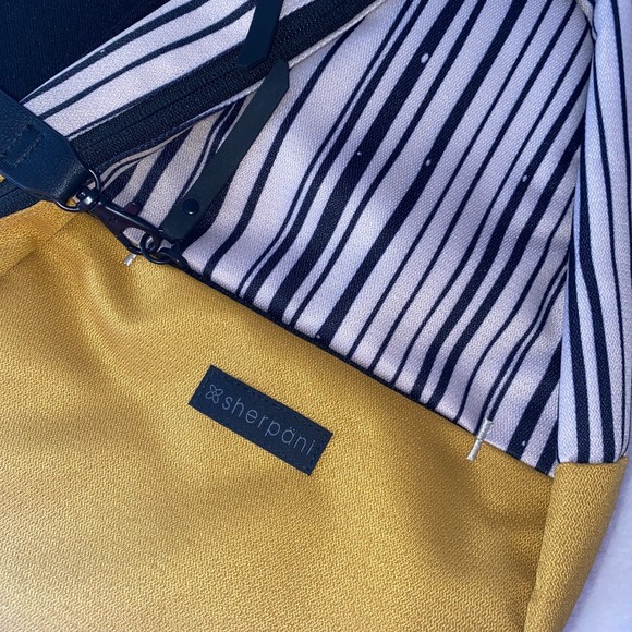 Sherpani Espirit Sling backpack in the color yellow black white - Picture 10 of 11